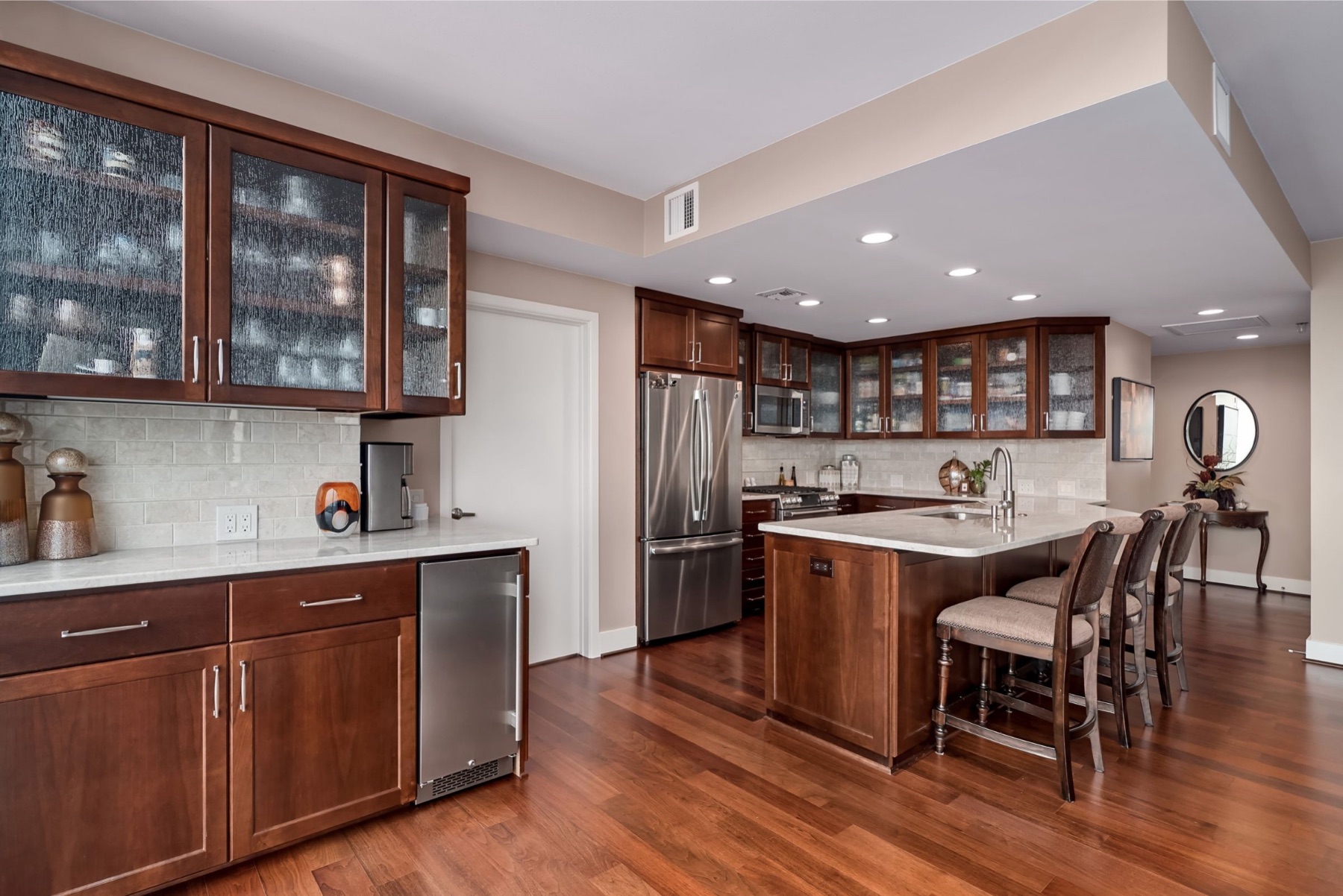 The Lake Austin craftsman kitchen remodel with warm wood cabinetry